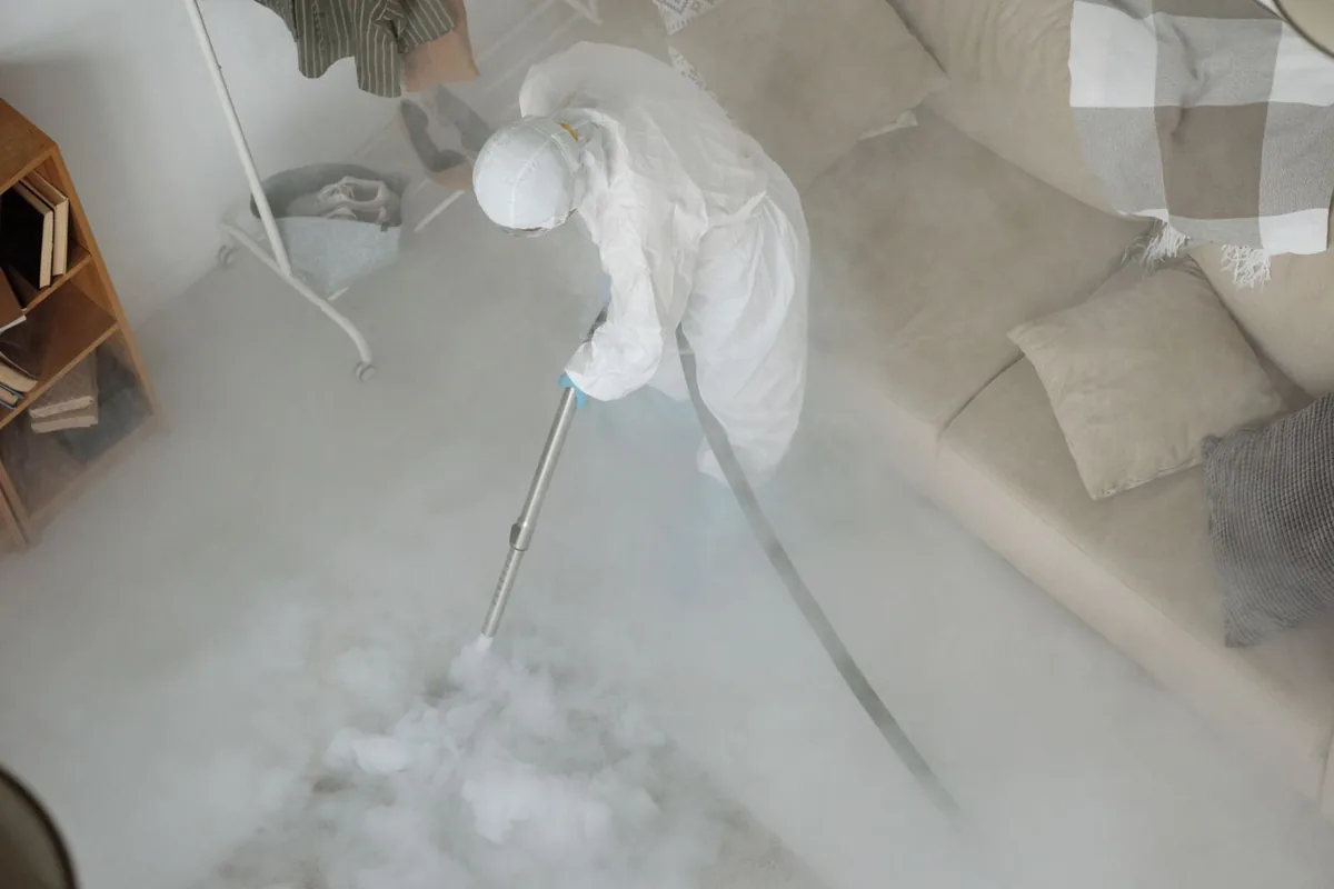 Biohazard cleanup technician in protective equipment, Palmyra, NJ